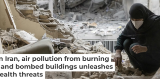 A woman sifts through the rubble in her home after it was damaged by a missile on March 15, 2026, in Tehran. Majid Saeedi/Getty Images